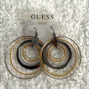 Guess hoop dangle earrings.